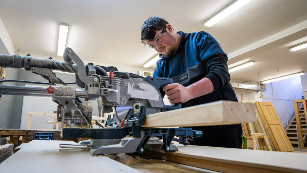 A joinery student in the workshop