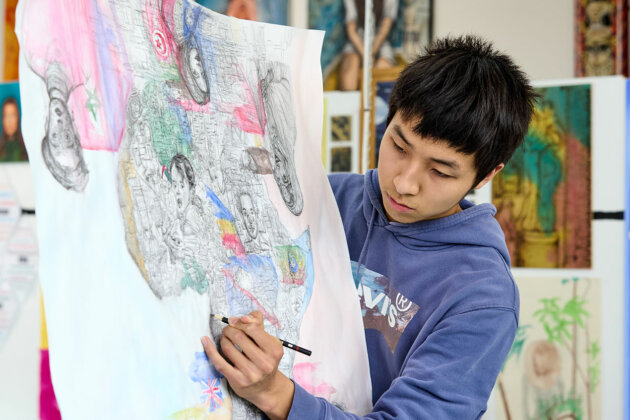 Image of an art student drawing