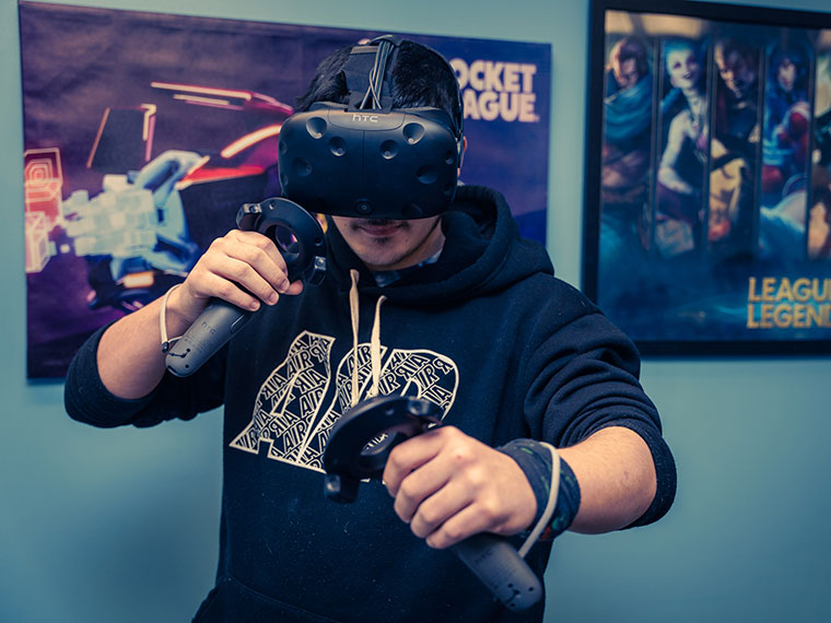 A games animation student using a VR headset