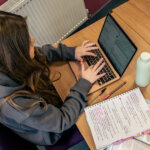 A student studying at a desk