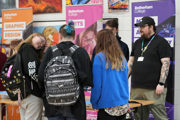 Students talking to staff at a Rotherham College open event