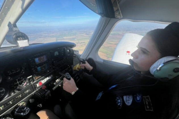 An aviation student flying a light aircraft