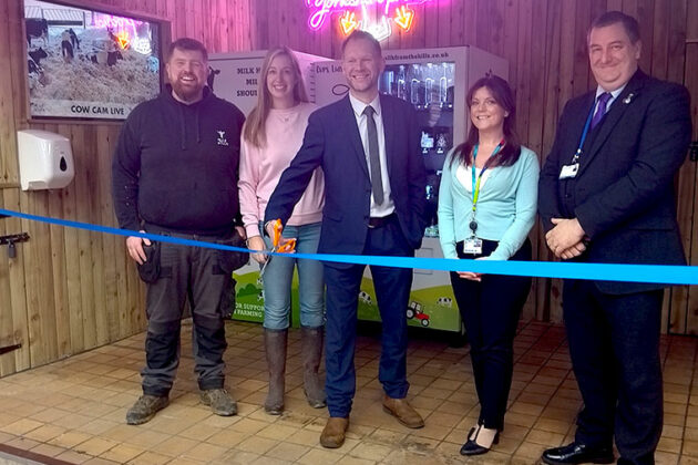 Cutting the ribbon to open Milk From The Hills in the Rotherham Market