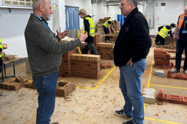 The Chairman of the Guild of Bricklayers visiting the Rotherham College bricklaying workshop