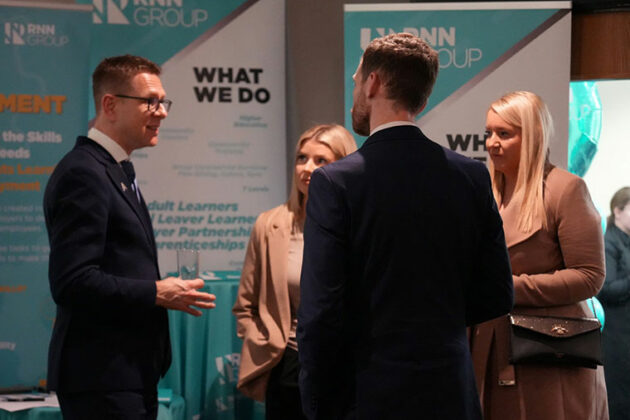 Anthony Impey MBE talking with people at the National Apprenticeship awards